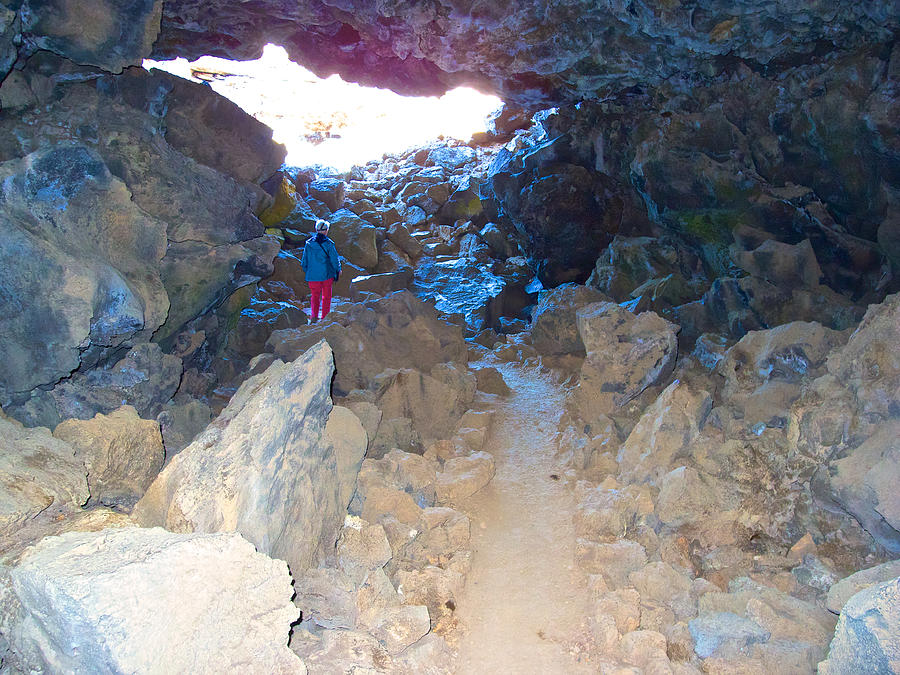 Leaving Sentinel Cave in Lava Beds National Monument, California Photograph by Ruth Hager