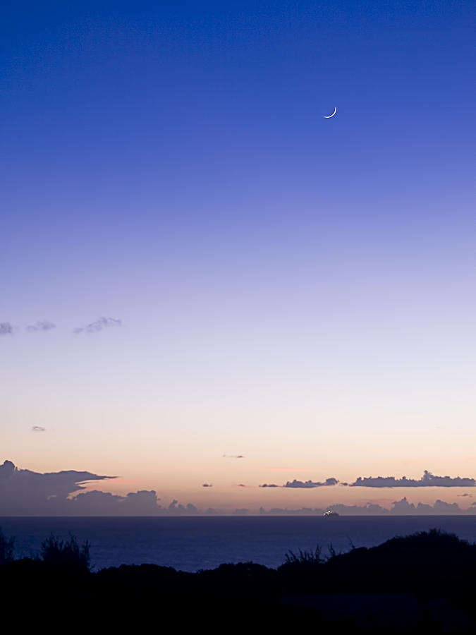 Sunset Photograph - Leaving under a crescent moon by Guy Roberts