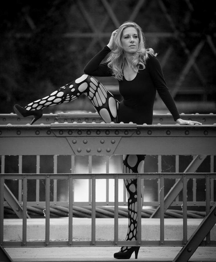 Black And White Photograph - Leg On A Balustrade by Ralf Kaiser