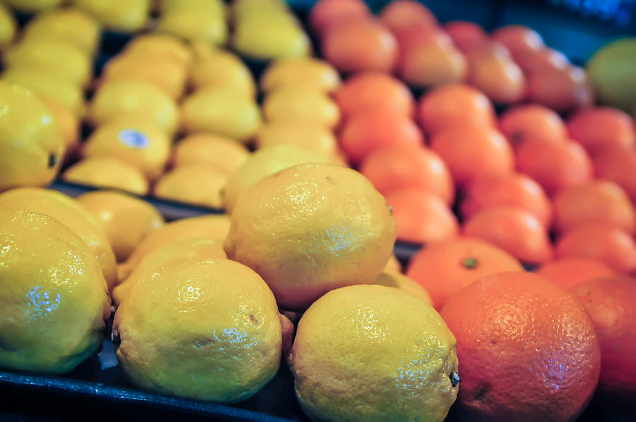 Lemon And Oranges On Produce Shelf Photograph by Alex Grichenko