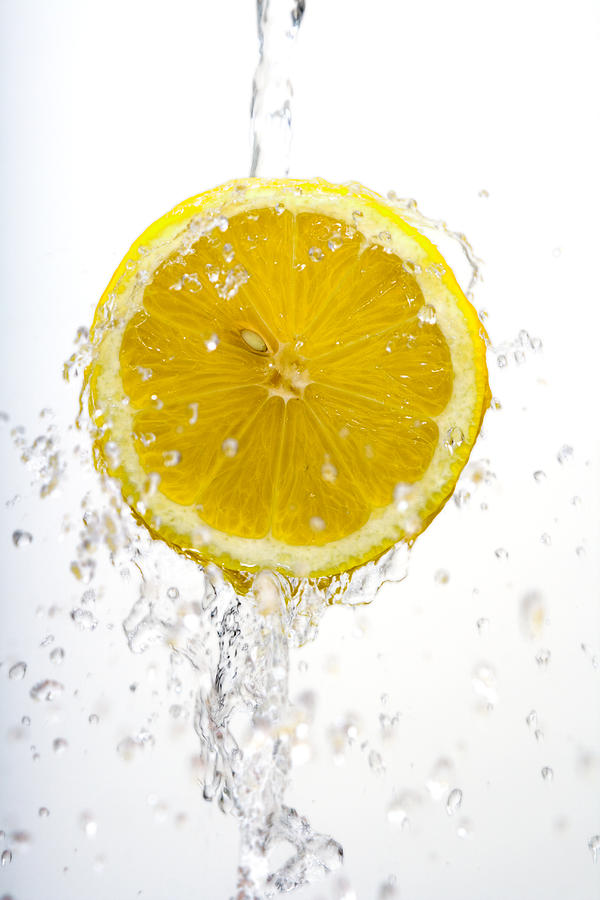 Lemon Splash Photograph by Alexey Stiop