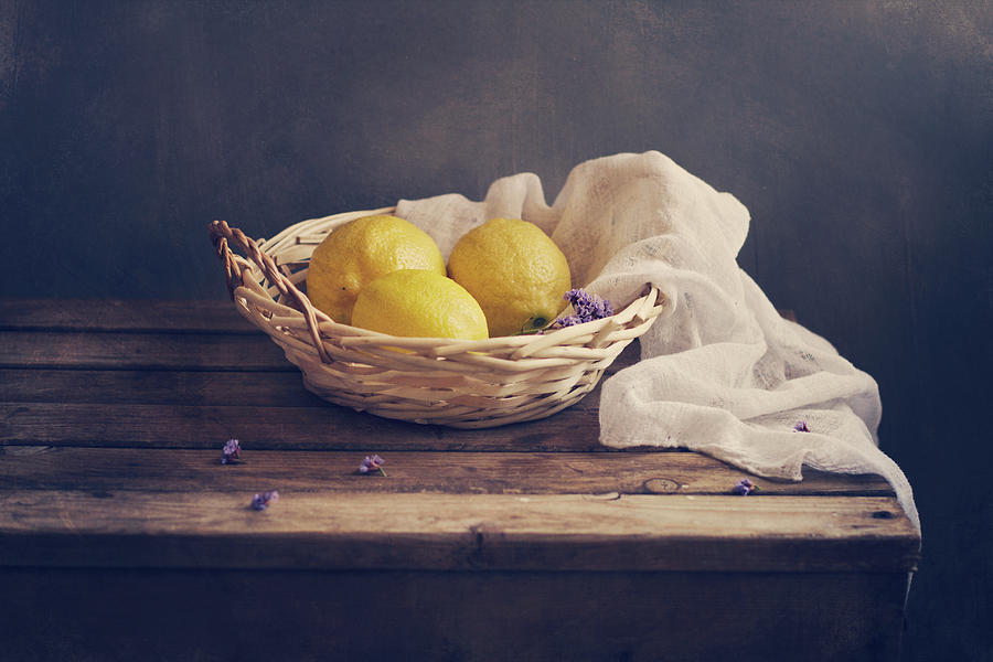 Lemons In Wicker Bowl With White Gauze Photograph by Copyright Anna Nemoy(xaomena)