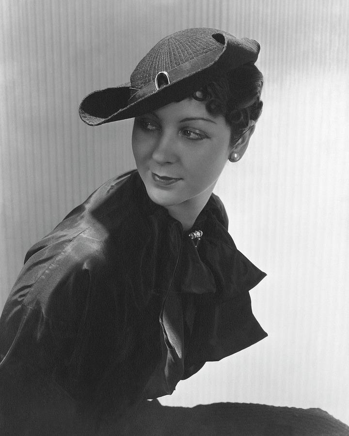 Lenore Pettit Wearing A Straw Hat Photograph by Lusha Nelson