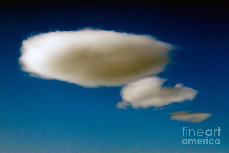 Lenticular Clouds Photograph by Tim Holt