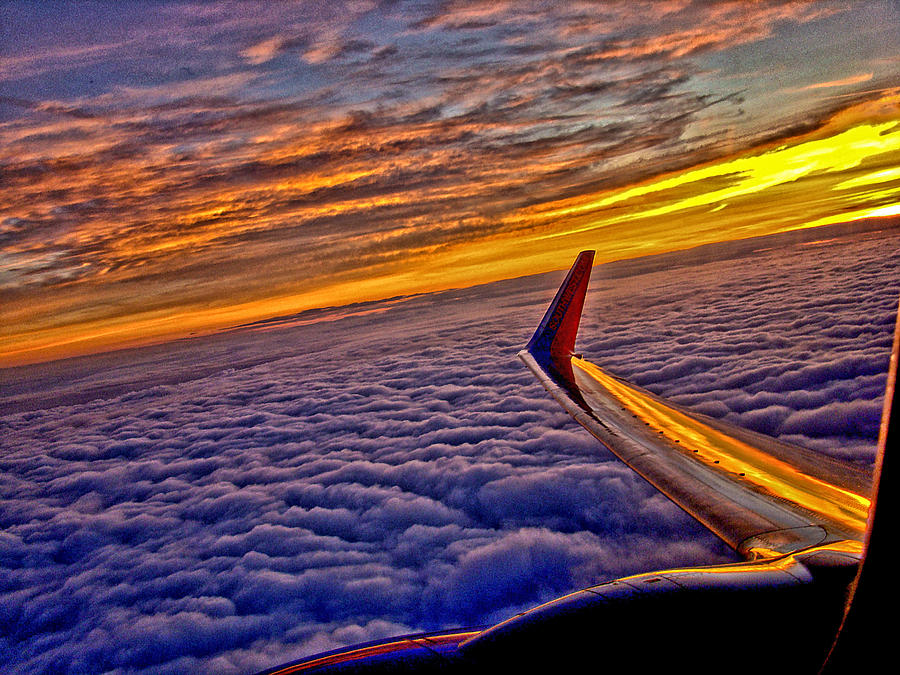Leving On A Jet Plane Photograph by Dennis Dugan