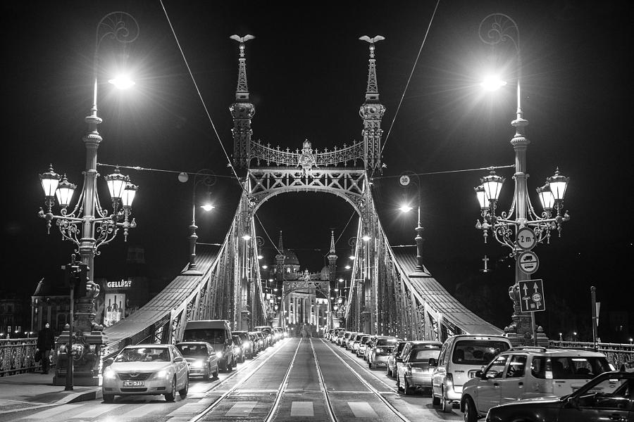Liberty Bridge at Night Photograph by Judith Barath
