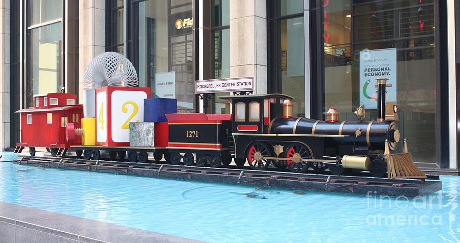 Life Size Toy Train Set in NYC Photograph by John Telfer