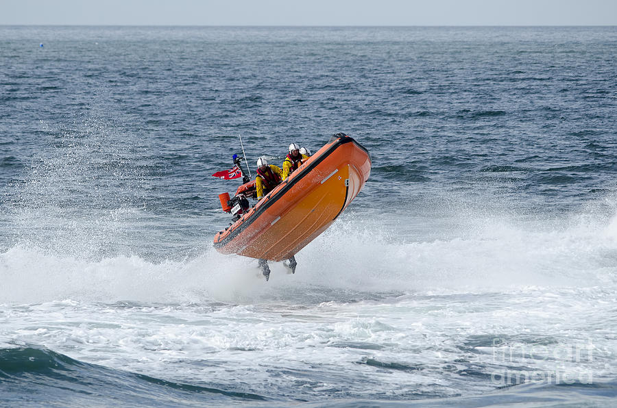 Lifeboat jump Photograph by Steev Stamford