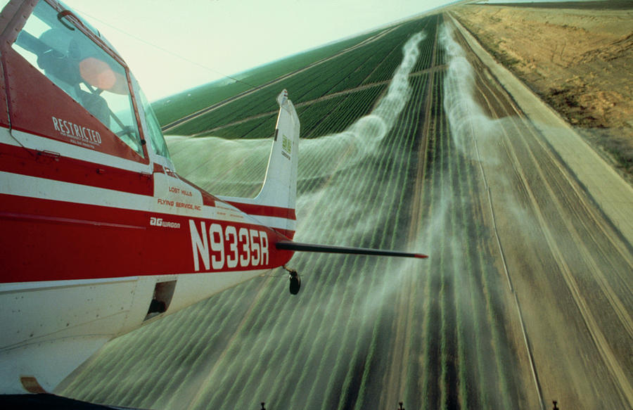 Light Aircraft Spraying Cotton Photograph by Peter Menzel/science Photo Library