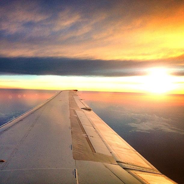 Sun Photograph - Light Between The Clouds. #sun #plane by Levi Golden