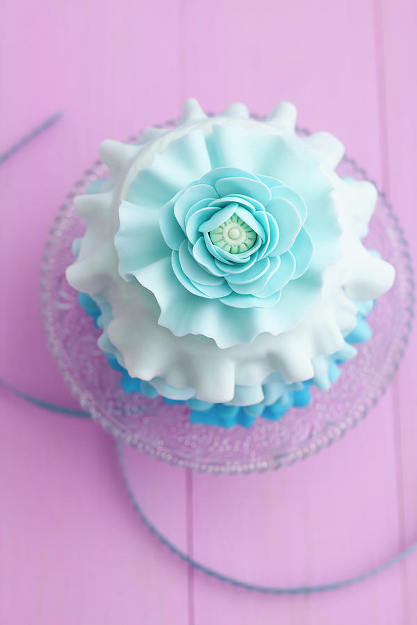 Light Blue Mini Cake On Cakestand Photograph by Westend61 Light Blue Mini Cake On Cakestand Photograph by Westend61