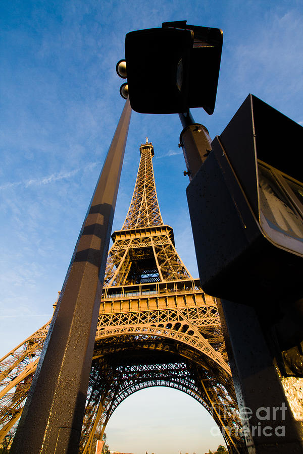 Light Poles and Eiffel Tower Photograph by Dan Hartford