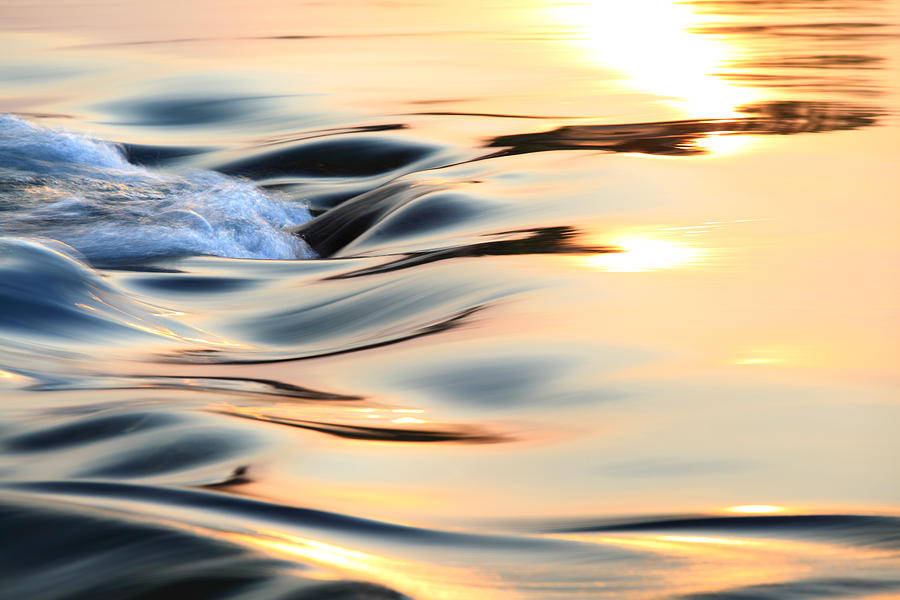 Light reflecting on flowing water Photograph by Bihaibo