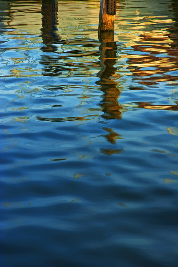 Light Reflections on the Water by a Dock at Aransas Pass Photograph by Randall Nyhof
