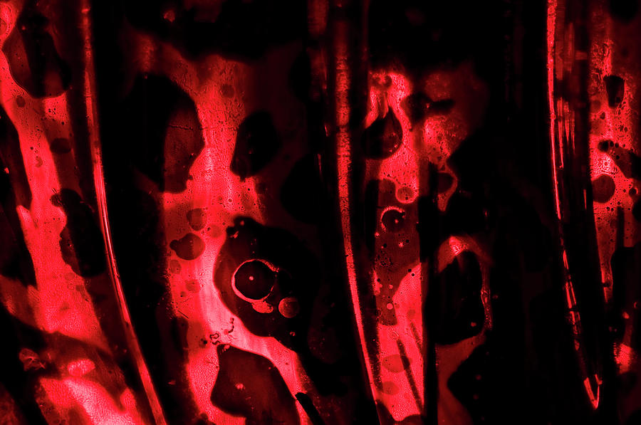 Light Refracted Through A Red Glass Photograph by Rachel Husband