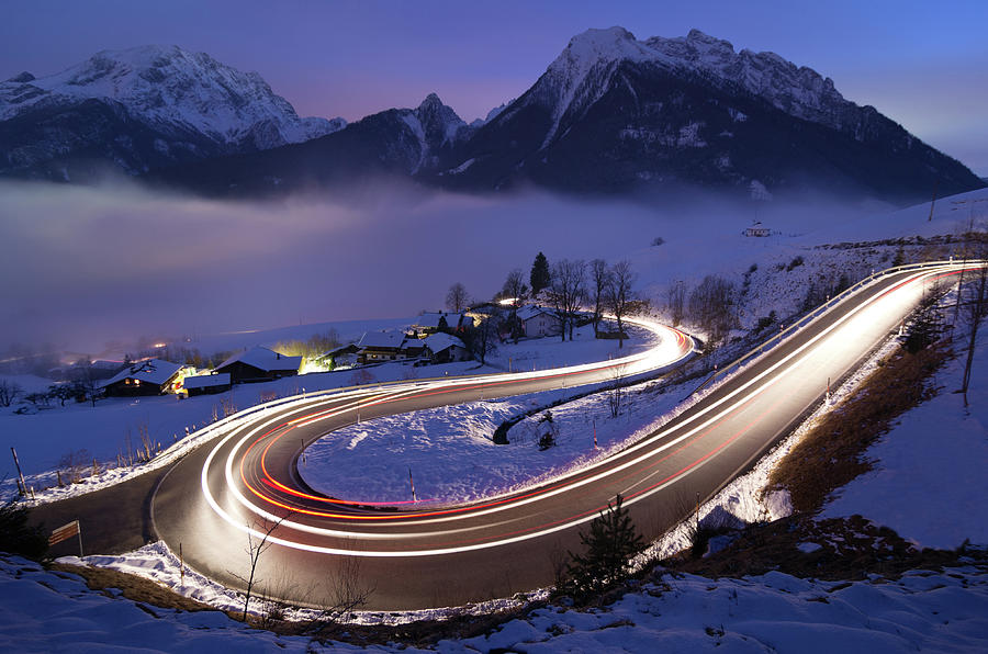 Light Trails On German Mountain Road In Photograph by Daitozen