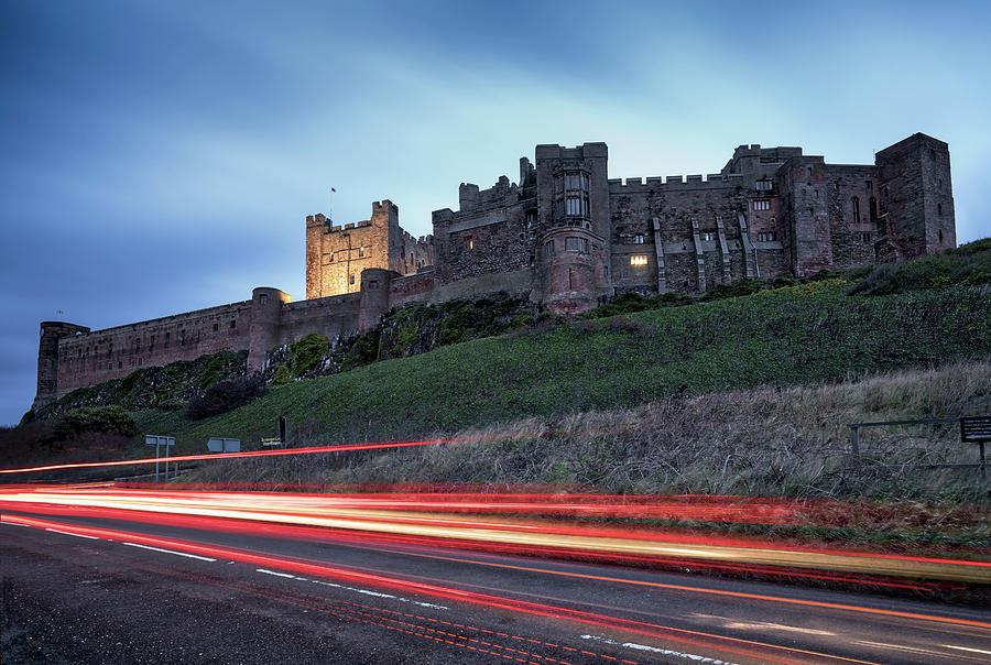Light Trails On The Road And Bamburgh Photograph by John Short