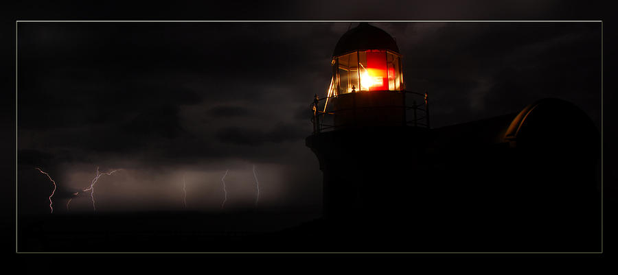 Lighthouse Photograph - Lighted Lighthouse by Andrew Prince