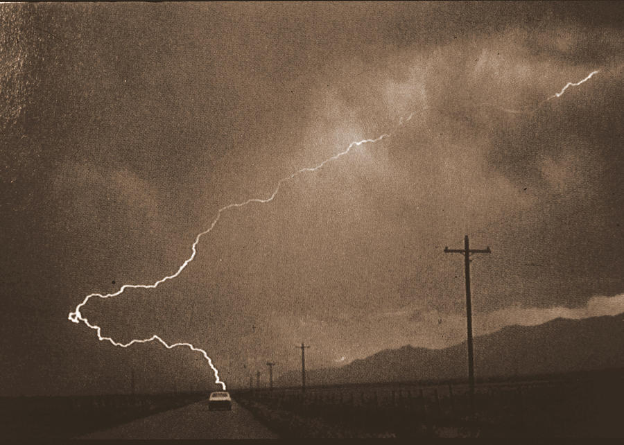 Lightening Strike Photograph by John Warren
