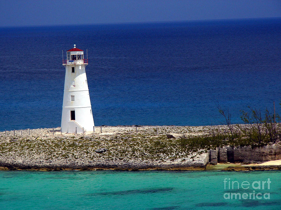 Beach Photograph - Lighthouse along coast of Paradise Island Bahamas by Amy Cicconi