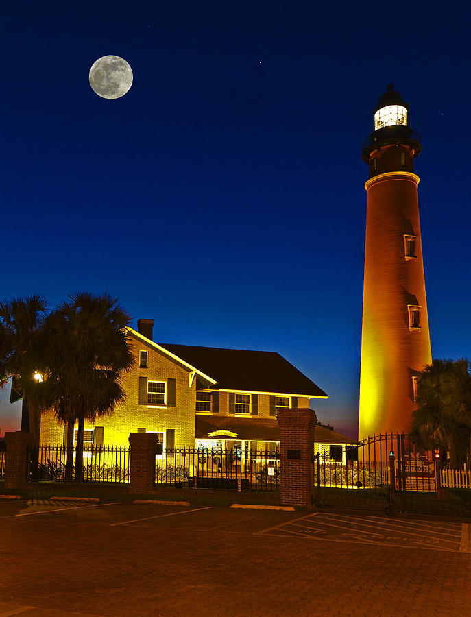 Lighthouse and Moon Photograph by Alex Mironyuk