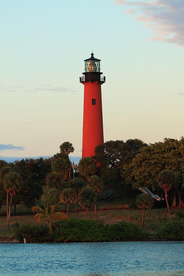 Lighthouse at dusk Photograph by Catie Canetti