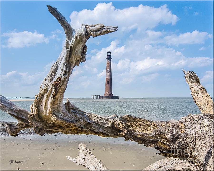 Lighthouse at Folly Beach Photograph by Mike Covington