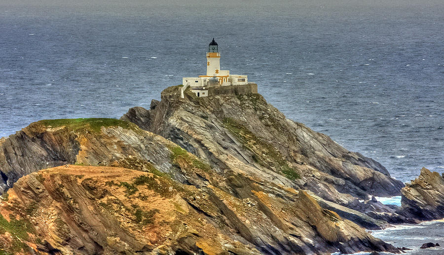 Lighthouse at Muckle Flugga Photograph by Jennifer LaBouff