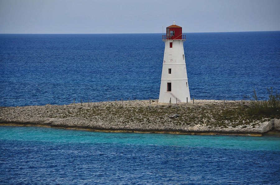 Lighthouse At Nassau Harbor Photograph by Mary Beth Angelo