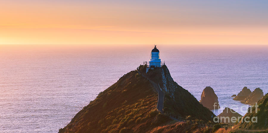 Lighthouse at Nugget Point Photograph by Henk Meijer Photography