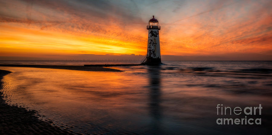 Sunset Photograph - Lighthouse At Sunset by Adrian Evans