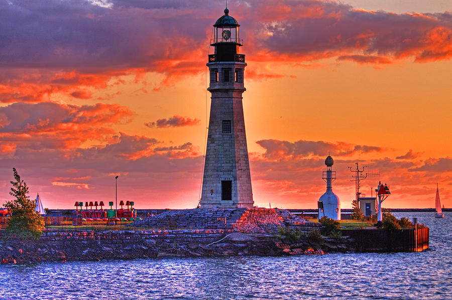 Lighthouse at Sunset Photograph by Don Nieman