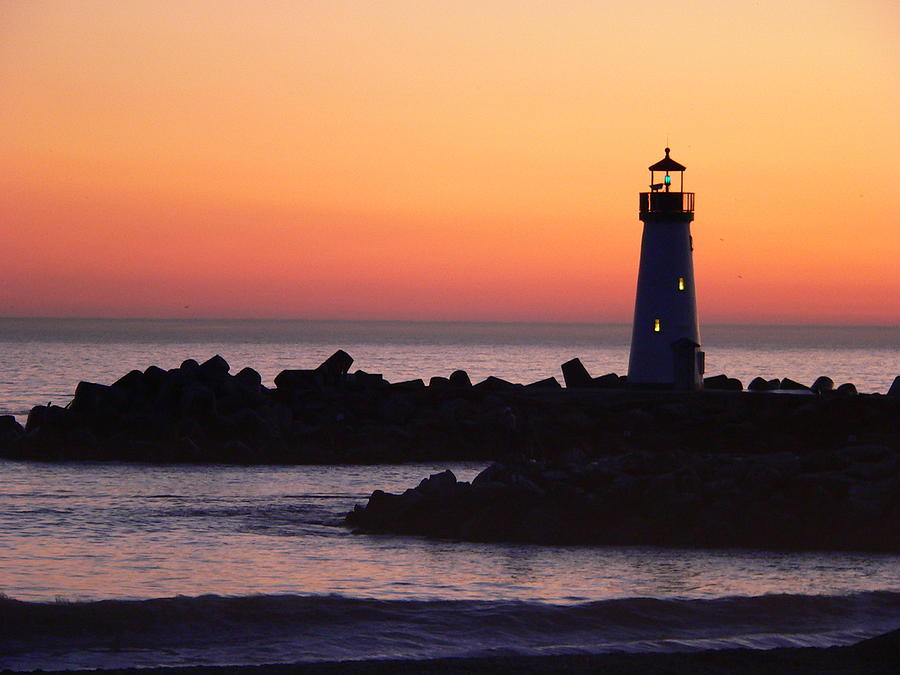 Lighthouse at Sunset Photograph by Jeff Lowe