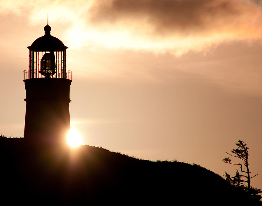 Lighthouse at Sunset Photograph by Roberta Kayne
