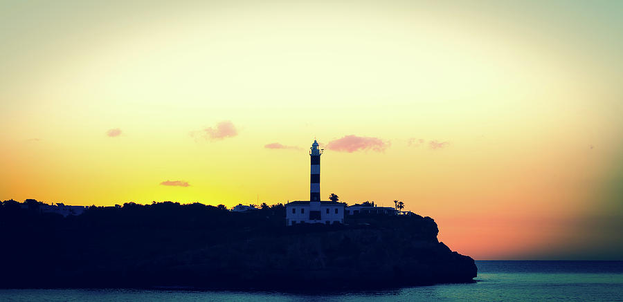 Lighthouse At Sunset Photograph by Wladimir Bulgar