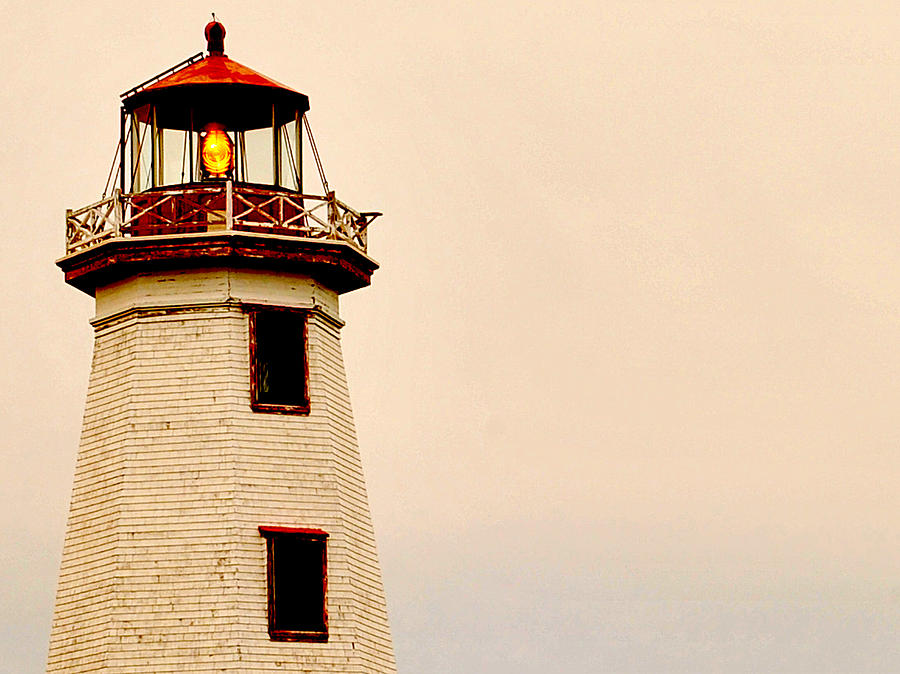 Lighthouse Photograph - Lighthouse beam by Steve Archbold