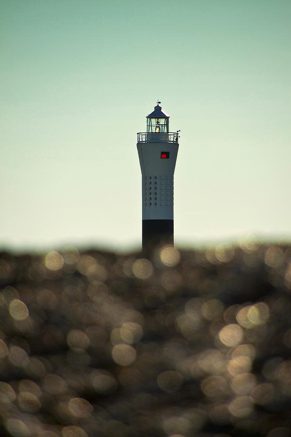 Pebbles Photograph - Lighthouse Bokeh by Nigel Jones