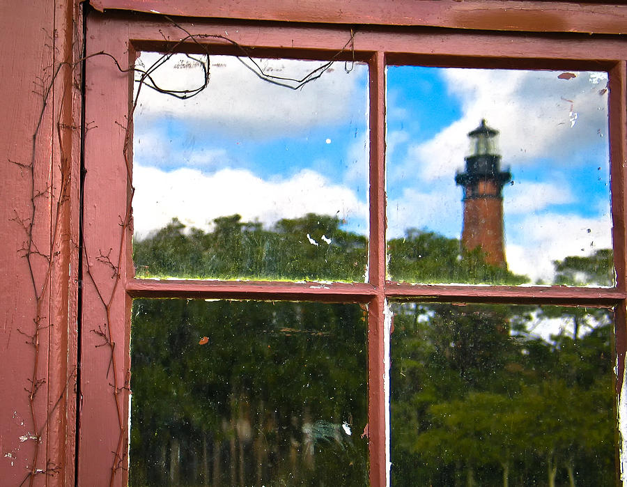 Lighthouse in a window Photograph by Cindy Archbell
