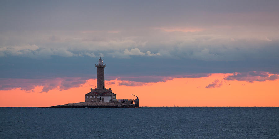 Lighthouse in dusk Photograph by Davorin Mance