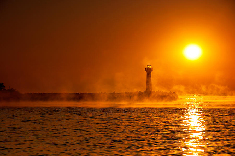 Lighthouse In Foggy Morning Photograph