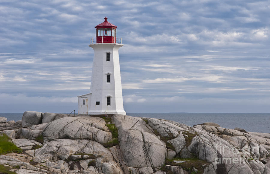 Lighthouse In Peggys Cove Photograph by Bill Bachmann