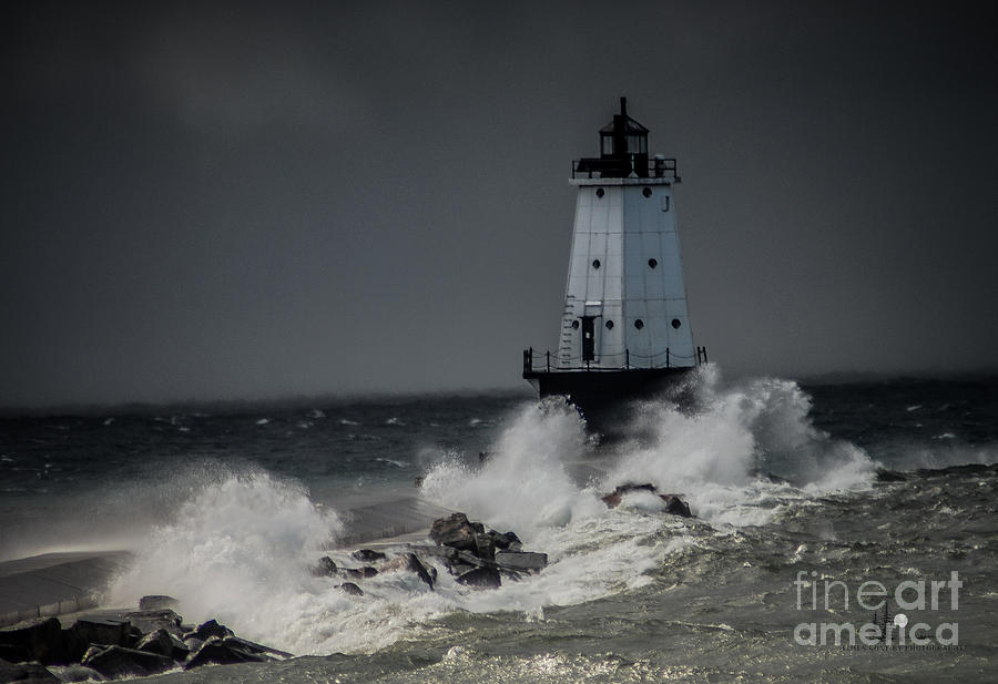 Lighthouse in Storm Photograph by Ronald Grogan
