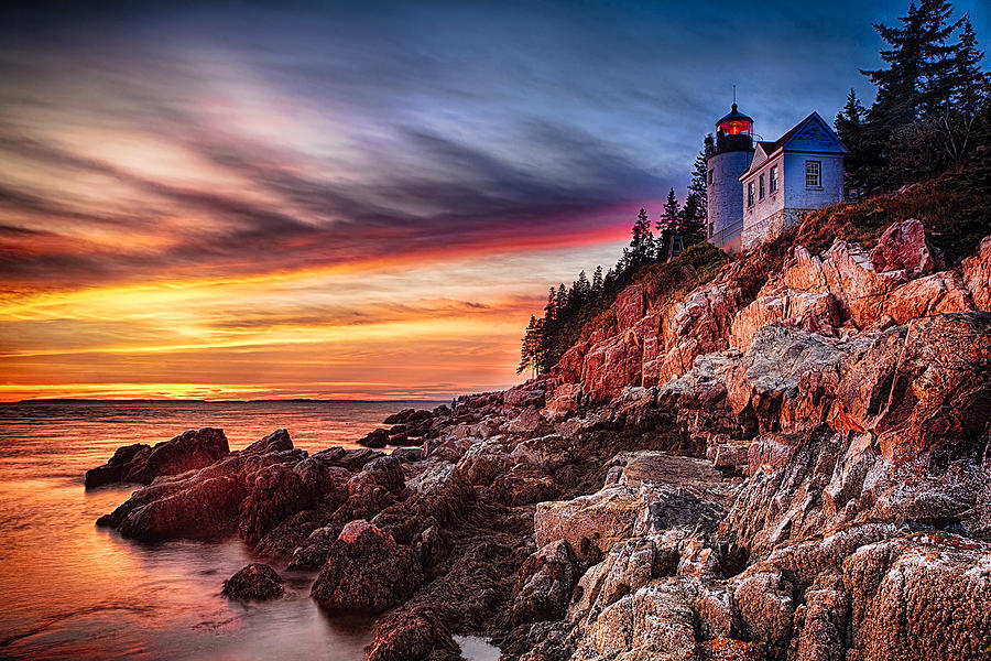 Lighthouse On A Cliff At Sunset Photograph by George Oze
