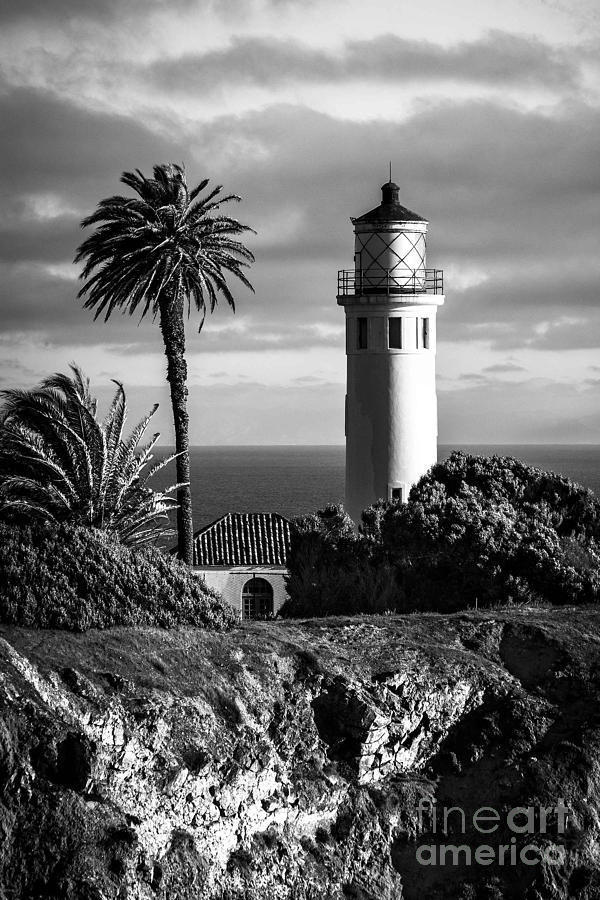 Lighthouse on the Bluff Photograph by Jerry Cowart
