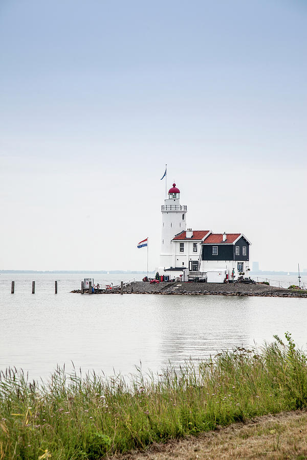 Lighthouse On The Netherlands Coast Photograph by Buena Vista Images