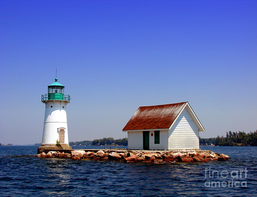 Lighthouse Photograph - Lighthouse on the St Lawrence River by Olivier Le Queinec