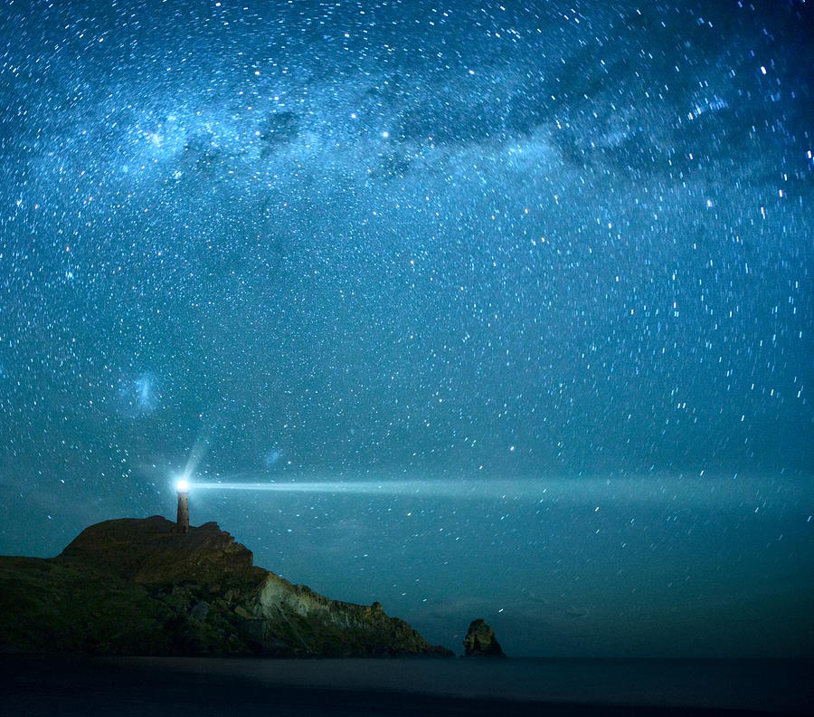 Lighthouse Under Milky Way stars Photograph by Piskunov