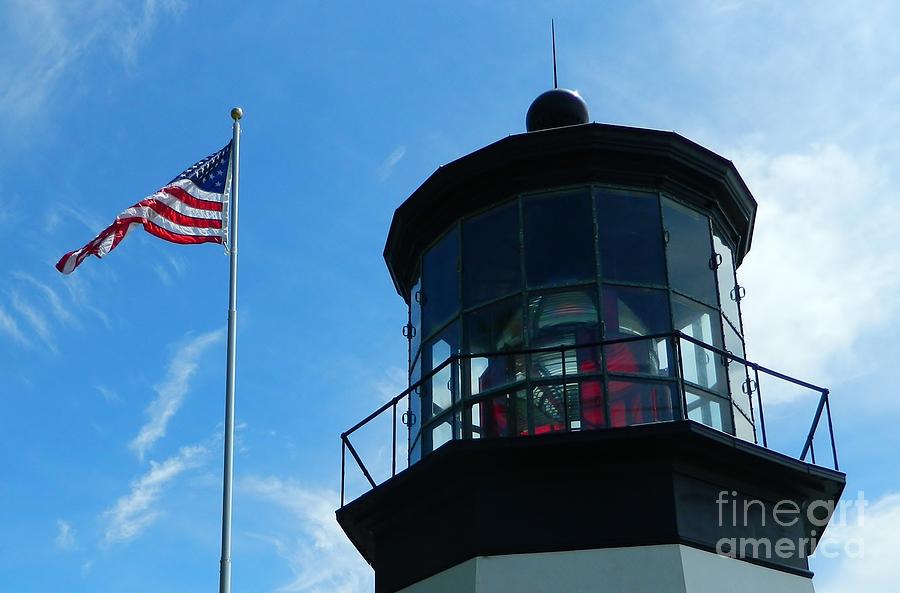 Lighthouse with Flag Photograph by Gallery Of Hope 