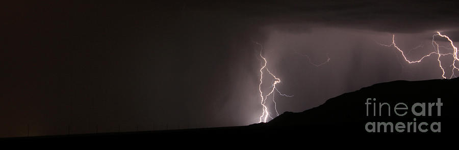 Lightning on the hill. Photograph by Balanced Art