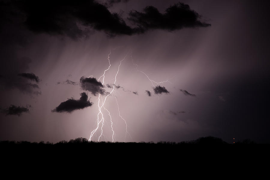 Lightning over woods Photograph by Jason York